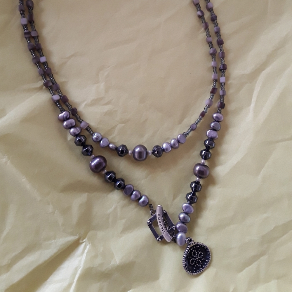 SIlpada necklace....
